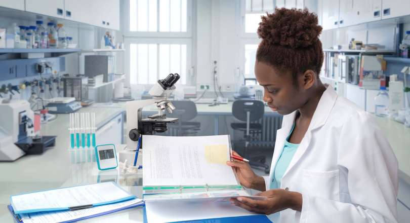 A woman working in a lab