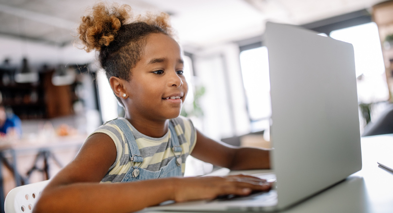 School girl on laptop