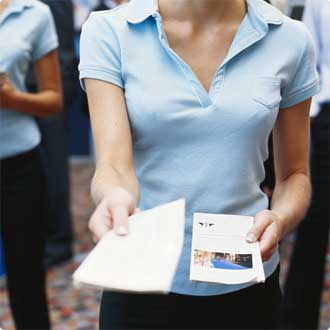 Person handing out leaflet